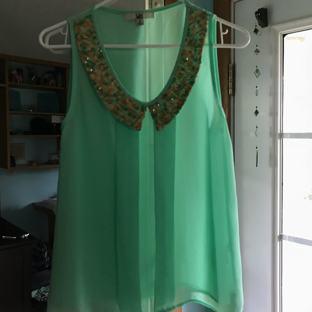 mint sleeveless blouse with sequin collar